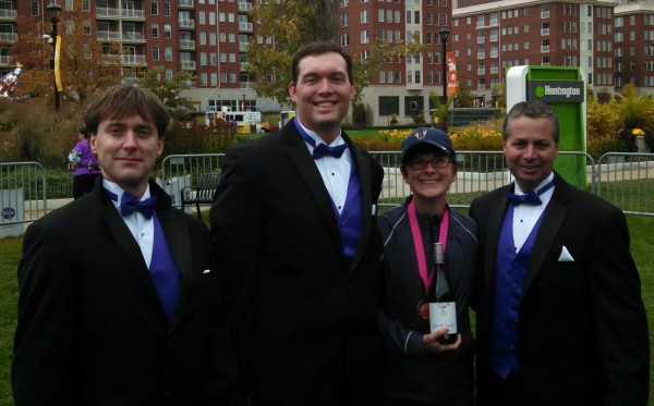Men in tuxedos handing out wine!