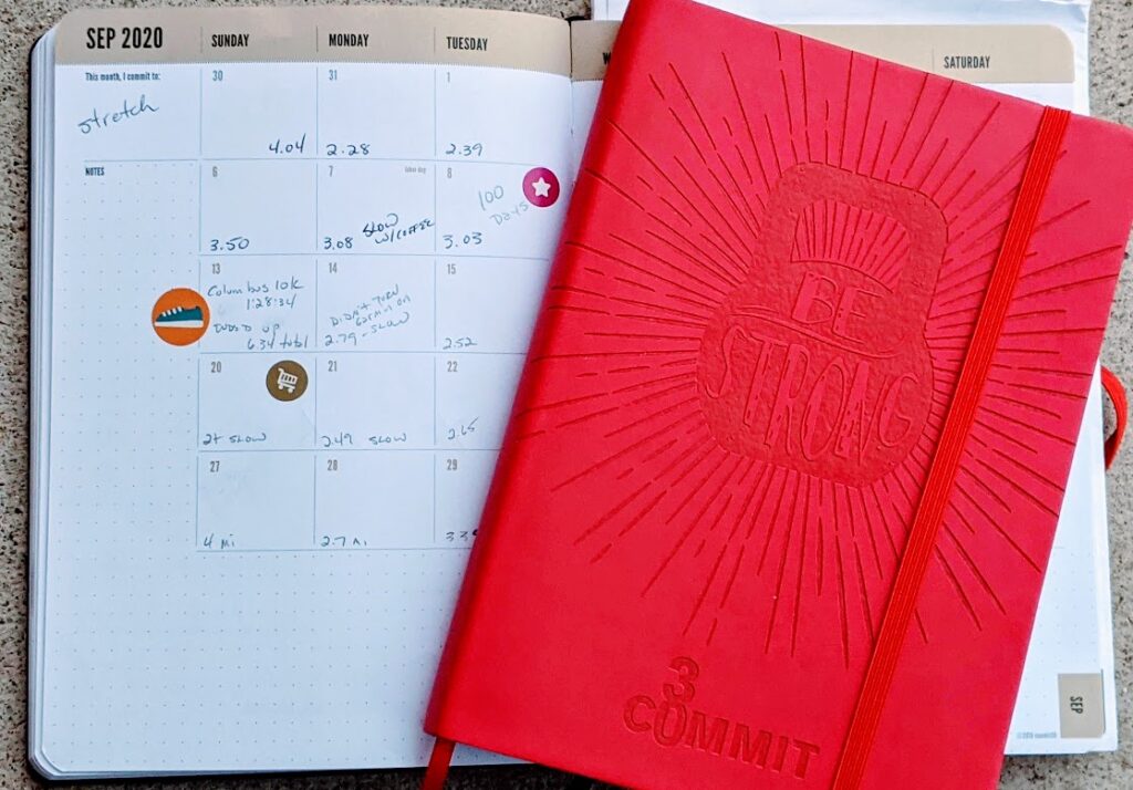 Use a fitness journal like the Commit30 to track your fitness goals.