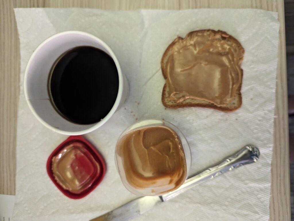 my race morning breakfast of toast with peanut butter and coffee