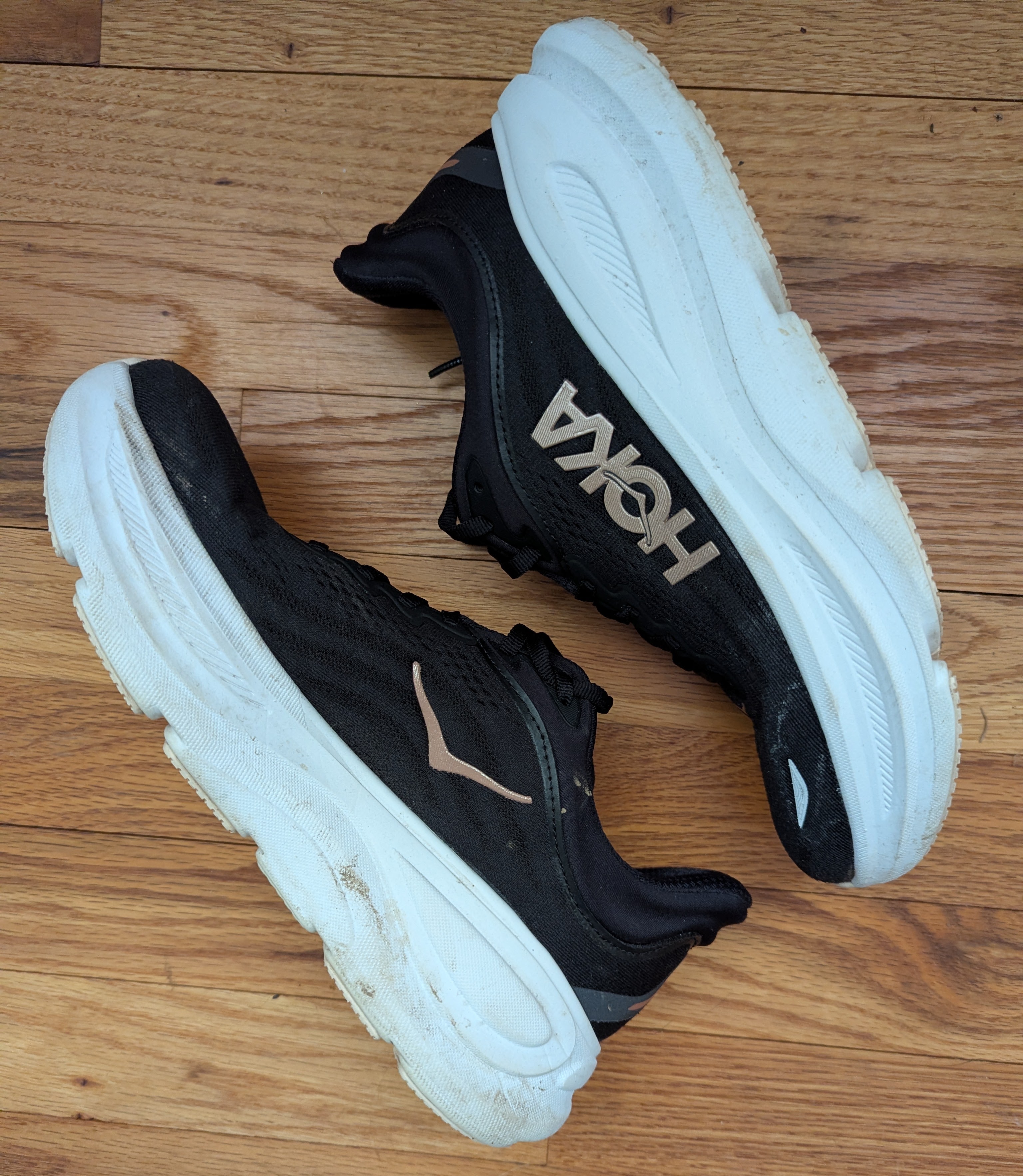 pair of back Hoka walking shoes